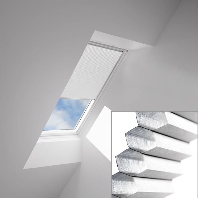 VELUX skylight with pleated blinds to darken a room by Wisconsin Sunlight Solutions.
